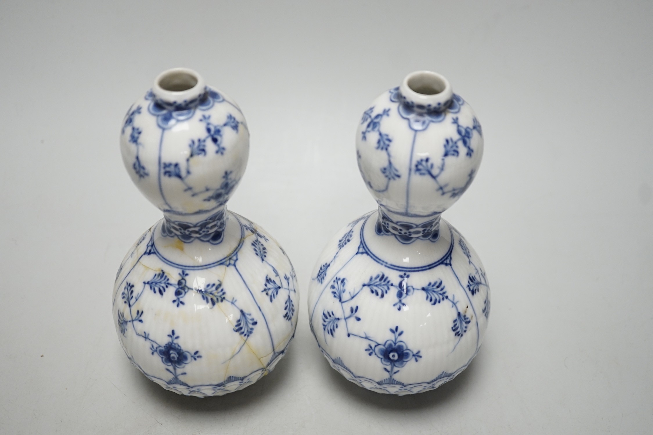 A pair of Royal Copenhagen onion pattern vases, 17cm
